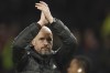 Manchester United's head coach Erik ten Hag applauds to fans after the English Premier League soccer match between Manchester United and Nottingham Forest at Old Trafford in Manchester, England, Tuesday, Dec. 27, 2022. (AP Photo/Dave Thompson)