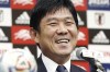 Japan’s national team coach Hajime Moriyasu smiles during a press conference in Tokyo, Wednesday Dec. 28, 2022. Moriyasu has been reappointed to the job after the Samurai Blue reached this final 16 of this year’s World Cup in Qatar, the Japan Football Association said on Wednesday.(Kyodo News via AP)