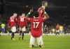 Manchester United's Fred celebrates after scoring his side's third goal during the English Premier League soccer match between Manchester United and Nottingham Forest at Old Trafford in Manchester, England, Tuesday, Dec. 27, 2022. (AP Photo/Dave Thompson)