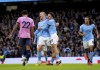 Manchester City's Erling Haaland, centre, celebrates after scoring the opening goal during the English Premier League soccer match between Manchester City and Everton at the Etihad Stadium in Manchester, England, Saturday, Dec. 31, 2022. (Tim Goode/PA via AP)