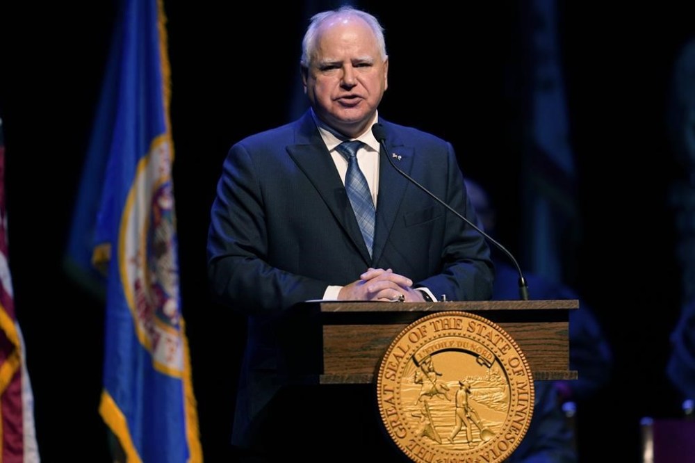 Minnesota Gov. Tim Walz delivers a speech after being sworn in for his second term during his inauguration, Monday, Jan. 2, 2023, in St. Paul, Minn. (AP Photo/Abbie Parr)