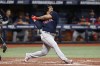 FILE - Boston Red Sox's Rafael Devers watches his RBI-single against the Tampa Bay Rays during the third inning of a baseball game Monday, Sept. 5, 2022, in St. Petersburg, Fla. The Boston Red Sox have agreed to a one-year contract with two-time All-Star Rafael Devers that avoided salary arbitration. (AP Photo/Scott Audette, File)