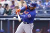 FILE - New York Mets' Dominic Smith singles in the second inning of a spring training baseball game against the Houston Astros, Monday, April 4, 2022, in West Palm Beach, Fla. Outfielder and first baseman Dominic Smith agreed to a one-year contract with the Washington Nationals pending the successful completion of a physical exam, a person familiar with the negotiations told The Associated Press on Tuesday, Jan. 3, 2023. (AP Photo/Sue Ogrocki, File)