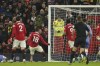 Manchester United's Casemiro, second from left, scores the opening goal during the English Premier League soccer match between Manchester United and Bournemouth at Old Trafford in Manchester, England, Tuesday, Jan. 3, 2023. (AP Photo/Dave Thompson)