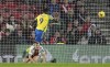Nottingham Forest's Taiwo Awoniyi scores their side's first goal of the game as Southampton's James Ward-Prowse looks on during the English Premier League soccer match between Southampton and Nottingham Forest at St Mary's Stadium in Southampton, England, Wednesday Jan. 4, 2023. (Adam Davy/PA via AP)