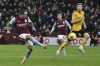 Aston Villa's Danny Ings scores his side's first goal during the English Premier League soccer match between Aston Villa and Wolverhampton Wanderers at Villa Park stadium in Birmingham, England Wednesday, Jan. 4, 2023. (AP Photo/Rui Vieira)