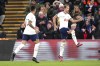 Tottenham Hotspur's Harry Kane, right, celebrates scoring against Crystal Palace during the English Premier League soccer match at Selhurst Park, London, Wednesday Jan. 4, 2023. (Zac Goodwin/PA via AP)