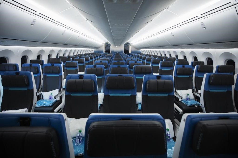Economy class seating in the new WestJet 787 Dreamliner airplane is shown in Calgary on February 14, 2019. As Canadian public health officials question China's transparency in sharing its COVID-19 surveillance information, scientists are stepping up airplane wastewater testing to try to get an early warning of potential new variants. THE CANADIAN PRESS/Todd Korol