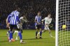 Newcastle United's Alexander Isak, center, heads the ball towards the goal during the English FA Cup third round soccer match between Sheffield Wednesday and Newcastle United at the Hillsborough Stadium, in Sheffield, Saturday, Jan. 7, 2023. (Nick Potts/PA via AP)