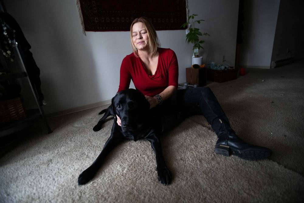 Veronika Kanya was on her way to jiu jitsu class with her service dog Apache on Nov. 27 when she says two consecutive Uber drivers refused to give her a ride, saying “no dogs,” even after Kanya explained she is blind and her dog is not a pet. (Daniel Crump / Winnipeg Free Press files)