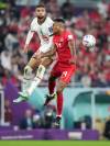 Nathan Denette / The Canadian Press
                                Morocco forward Yousseff En-Nesyri (left) and Canada midfielder Mark-Anthony Kaye challenge for the ball Thursday in Doha, Qatar.