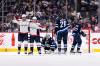 FRED GREENSLADE / THE CANADIAN PRESS
                                Washington Capitals’ Evgeny Kuznetsov (92) celebrates his goal against the Winnipeg Jets goaltender Connor Hellebuyck (37) with Conor Sheary (73) during second period NHL action in Winnipeg, Sunday, Dec. 11, 2022.