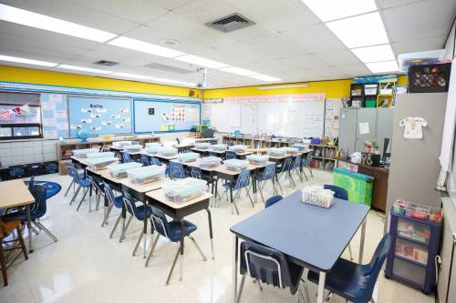 MIKE DEAL / WINNIPEG FREE PRESS
                                A classroom at Darwin School, Wednesday morning where a supplemental HEPA air purifier unit was placed in the gymnasium. The purpose is simply to supplement the air exchange as there is lots of activity in the room. Parents at Darwin School will be relieved to learn the Louis Riel School Division performed an audit of air exchange across schools in 2021-22 to determine where upgrades were necessary. 220907 - Wednesday, September 07, 2022.