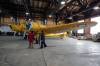 Colin Slark / Brandon Sun
                                Art Brown (left) and John McNarry inspect their work after moving a Bristol Bolingbroke aircraft at the Commonwealth Air Training Plan Museum in Brandon on Friday, clearing the way for temporary repairs to support the roof of the Second World War hangar.