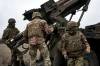 Libkos / The Associated Press files
                                Ukrainian soldiers prepare to fire a French-made CAESAR self-propelled howitzer towards Russian positions in the Donetsk region of Ukraine on Dec. 26.