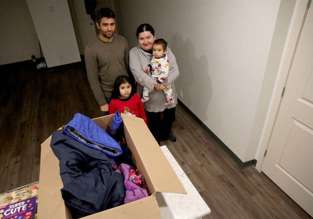 IAN HITCHEN / THE BRANDON SUN
Rocio Luna (on the right holding her son Muhammad) moved with her family to Canada from Mexico to study at Brandon University.