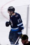 FRED GREENSLADE / THE CANADIAN PRESS
                                Winnipeg Jets’ Nikolaj Ehlers (27) celebrates his goal against the Vancouver Canucks during second period NHL action in Winnipeg on Sunday January 8, 2023.
