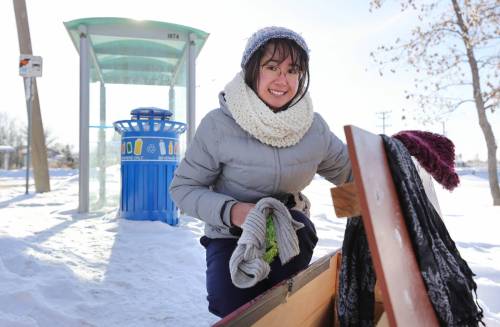 RUTH BONNEVILLE / WINNIPEG FREE PRESS
                                Taylor Boucher next to the McIvor Box she made as part of a school project, at the McIvor Bus Loop.