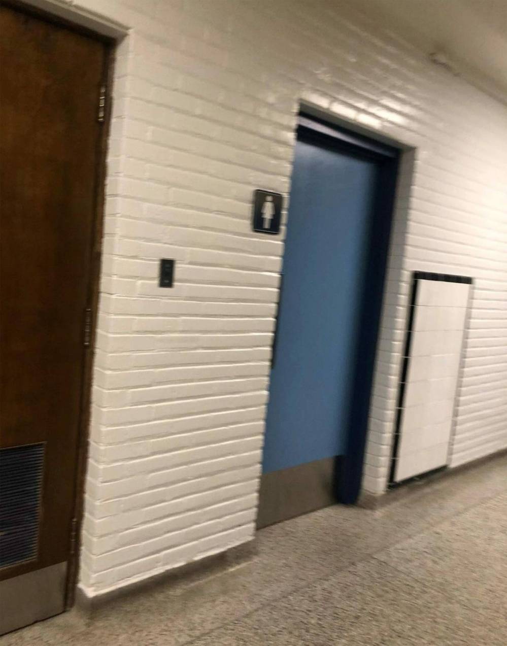 The door to the women’s washroom at St. James Collegiate was reinstalled Friday morning after it was removed in an effort to curb a spike in indoor vaping. (INSTAGRAM)