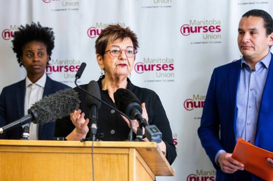Darlene Jackson, president of the Manitoba Nurses Union (centre), Uzoma Asagwara, NDP MLA (left), and Wab Kinew, leader of the Manitoba NDP party, spoke about their concerns for the future of the Sexual Assault Nurse Examiner program. (Mikaela Mackenzie / Winnipeg Free Press)