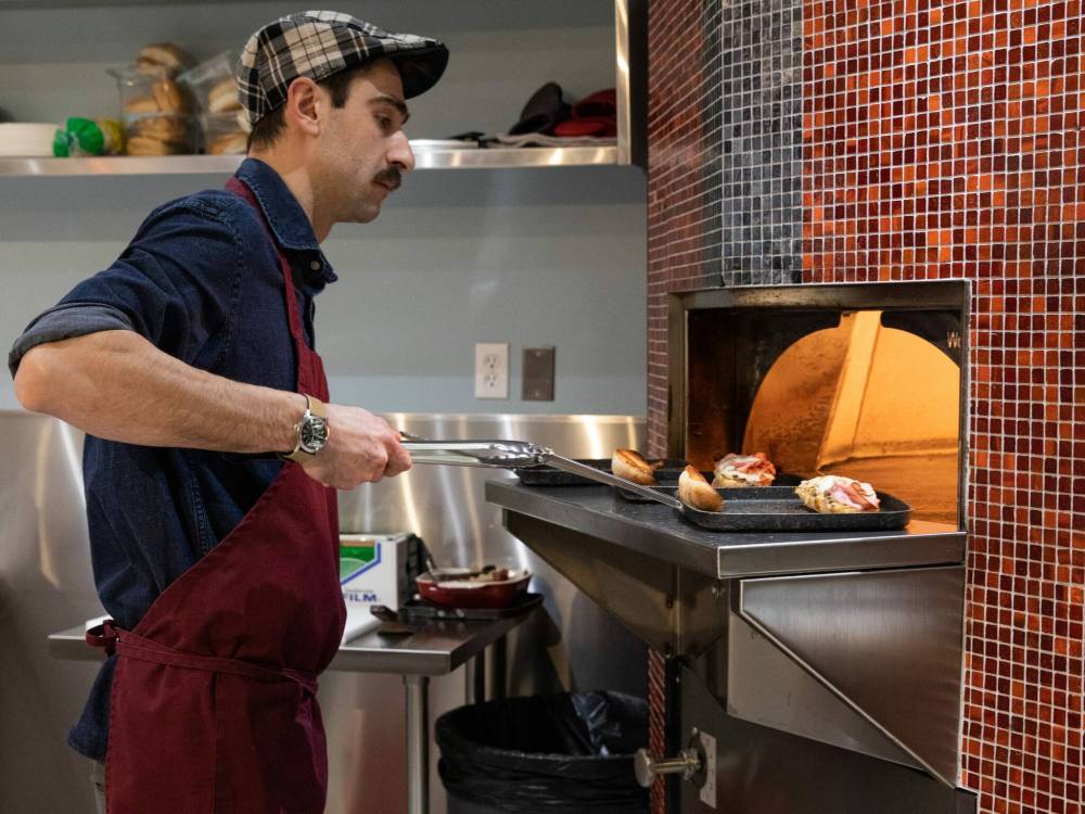 JESSICA LEE / WINNIPEG FREE PRESS
Zac Publicover follows in his father’s footsteps at Stonework’s. Take-home vacuum packs are on the way, as is gourmet dog food.
