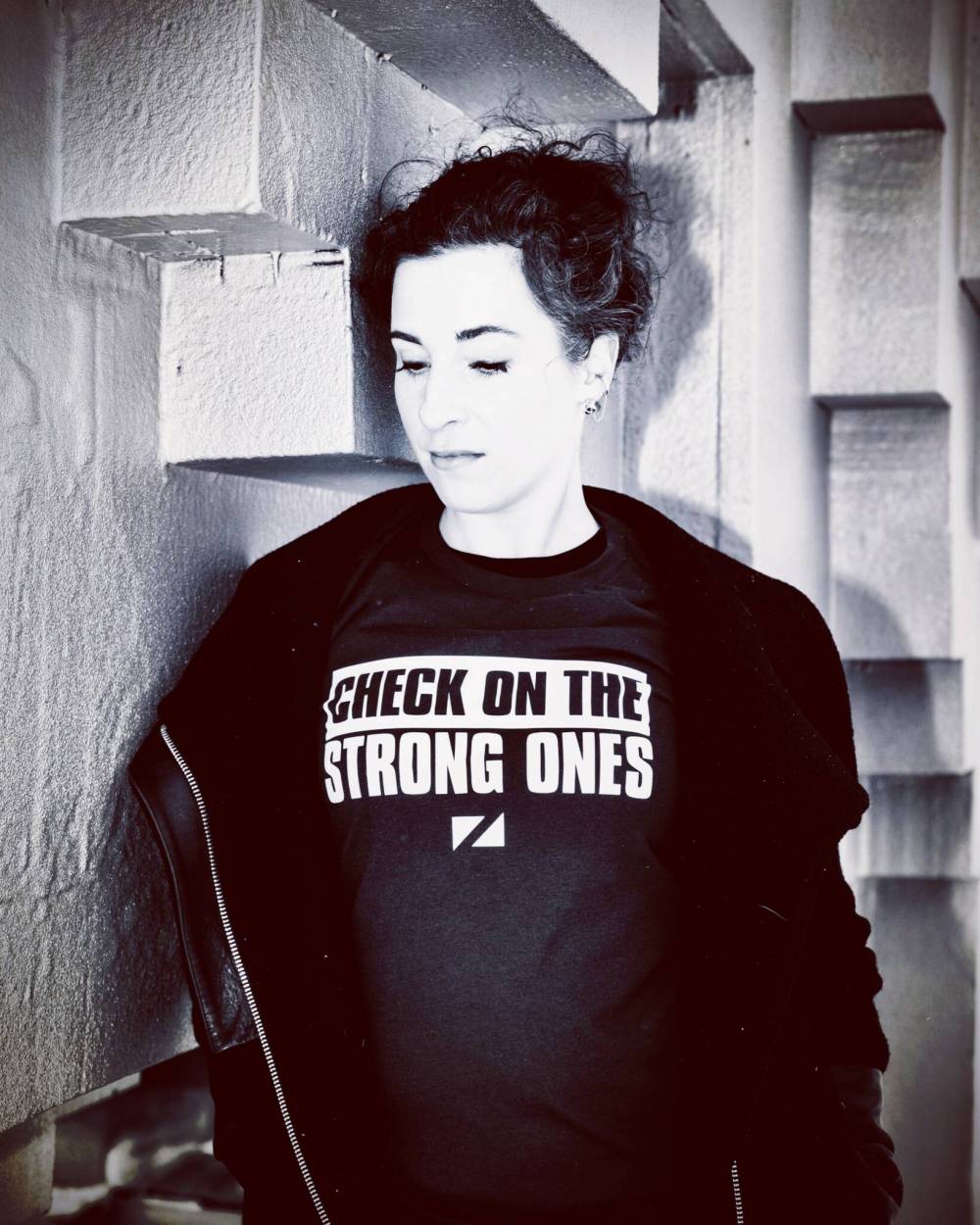 SUPPLIED
                                Stacia Franz wears the “Check on the strong ones” t-shirt that she had made in partnership with locally owned clothing company, Zueike. Proceeds from the sale of the shirt will be donated to mental health initiatives in Manitoba.