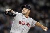 FILE - Boston Red Sox pitcher Rich Hill throws during the first inning of a baseball game against the New York Yankees on Friday, Sept. 23, 2022, in New York. Rich Hill has agreed to a one-year contract with Pittsburgh, giving the Pirates another veteran arm for their rotation, according to a person familiar with the deal. The person spoke to The Associated Press on Tuesday, Dec. 27, 2022 on condition of anonymity because the club had not announced the signing. (AP Photo/Adam Hunger, File)