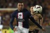 PSG's Kylian Mbappe races after the ball during the French League One soccer match between Lens and Paris Saint-Germain at the Bollaert stadium in Lens, France Sunday, Jan. 1, 2023 (AP Photo/Thibault Camus)