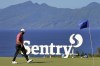 Jon Rahm, of Spain, walks across the 10th green during the final round of the Tournament of Champions golf event, Sunday, Jan. 8, 2023, at Kapalua Plantation Course in Kapalua, Hawaii. (AP Photo/Matt York)