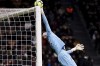 Torino's goalkeeper Vanja Milinkovic Savic in action during the round of 16 Italian Cup soccer match between AC Milan and Torino FC, at San Siro Stadium in Milan, Italy, Wednesday, Jan. 11, 2023. (Marco Alpozzi/LaPresse via AP)