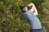 Thomas Pieters of Continental Europe tees off on the third hole during the Fourball matches of the Hero Cup at Abu Dhabi Golf Club, in Abu Dhabi, United Arab Emirates, Friday, Jan. 13, 2023. (AP Photo/Kamran Jebreili)