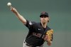 FILE - Cleveland Guardians starting pitcher Shane Bieber throws during the first inning of the team's baseball game against the Kansas City Royals on Sept. 6, 2022, in Kansas City, Mo. The Guardians reached agreement Friday, Jan. 13, with Bieber on a $10 million contract for next season and avoided salary arbitration. (AP Photo/Charlie Riedel, File)