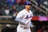 FILE - New York Mets' Pete Alonso is shown during the third inning in the first baseball game of a doubleheader against the Washington Nationals, Tuesday, Oct. 4, 2022, in New York. Alonso is among more than 200 players set to exchange proposed salary arbitration figures with their teams, but most were expected to reach agreements. (AP Photo/Frank Franklin II, File)