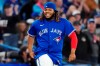 FILE - Toronto Blue Jays' Vladimir Guerrero Jr. celebrates after the team's win over the Tampa Bay Rays in a baseball game Sept. 14, 2022, in Toronto. Guerrero and the Blue Jays avoided salary arbitration Friday night, Jan. 13, by agreeing to a $14.5 million contract for next season. (Frank Gunn/The Canadian Press via AP, File)