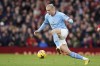 Manchester City's Erling Haaland controls the ball during the English Premier League soccer match between Manchester United and Manchester City at Old Trafford in Manchester, England, Saturday, Jan. 14, 2023. (AP Photo/Dave Thompson)