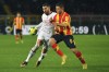 AC Milan's Theo Hernandez, left, battles for the ball with Lecce's Lorenzo Colombo during the Serie A soccer match between US Lecce and AC Milan, in Lecce, Saturday, Jan. 14, 2023. (Giovanni Evangelista /LaPresse via AP)