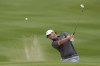 Ewen Ferguson of Scotland and the Great Britain and Ireland Team, plays a bunker on second hole, during the final round of the Hero Cup at Abu Dhabi Golf Club, in Abu Dhabi, United Arab Emirates, Sunday, Jan. 15, 2023. (AP Photo/Kamran Jebreili)