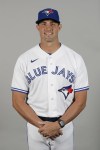 This is a 2020 photo of Matt Buschmann of the Toronto Blue Jays baseball team. The Blue Jays will be in search of a new bullpen coach. The team announced Sunday that Buschmann has opted to leave the organization to pursue other opportunities. THE CANADIAN PRESS/AP/Frank Franklin II