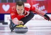 Team Canada skip Brendan Bottcher makes a shot while playing Team Wild Card Three during playoff action at the Tim Hortons Brier in Lethbridge, Alta., Friday, March 11, 2022. THE CANADIAN PRESS/Jeff McIntosh