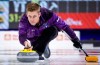 Team Yukon skip Thomas Scoffin makes a shot as he plays Team Newfoundland and Labrador at the Tim Hortons Brier in Lethbridge, Alta., Friday, March 4, 2022. THE CANADIAN PRESS/Jeff McIntosh