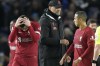 Liverpool's Andrew Robertson, left, reacts after the English Premier League soccer match between Brighton and Liverpool at the Falmer Stadium in Brighton, England, Saturday, Jan. 14, 2023. (AP Photo/Frank Augstein)
