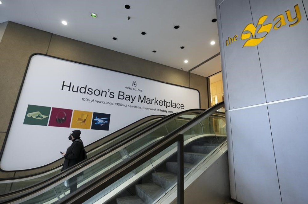 As some retailers look to tighten return policies, The Bay says it's making it easier for customers to return online purchases. A Hudson's Bay department store in Toronto, Friday, February 25, 2022. THE CANADIAN PRESS/Nathan Denette