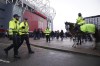 Police patrols outside the stadium before the English Premier League soccer match between Manchester United and Manchester City at Old Trafford in Manchester, England, Saturday, Jan. 14, 2023. (AP Photo/Dave Thompson)