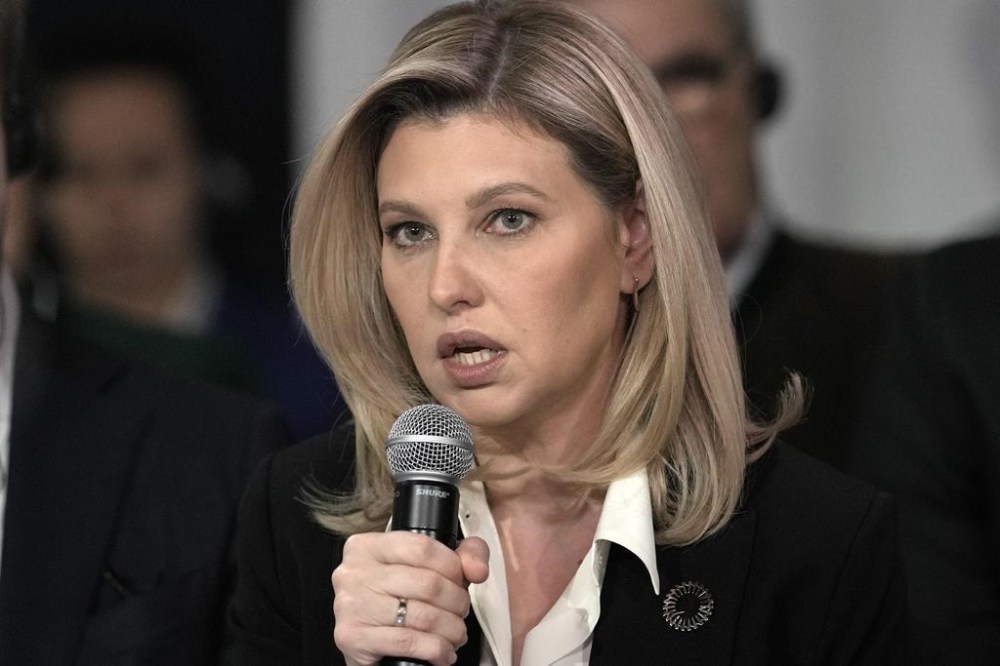 First Lady of Ukraine Olena Zelenska talks at the World Economic Forum in Davos, Switzerland after a minute of silence for a helicopter crash in Ukraine, where Minister of Internal Affairs Denys Monastyrsky died among others on Wednesday, Jan. 18, 2023. The annual meeting of the World Economic Forum is taking place in Davos from Jan. 16 until Jan. 20, 2023. (AP Photo/Markus Schreiber)