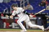 FILE - Miami Marlins' Brian Anderson follows through after hitting a single during the first inning of a baseball game against the Philadelphia Phillies, Wednesday, Sept. 14, 2022, in Miami. The Brewers have agreed to a $3.5 million, one-year contract with former Miami Marlins third baseman/right fielder Brian Anderson, a person familiar with the situation said Wednesday, Jan. 18, 2023. (AP Photo/Lynne Sladky, File)