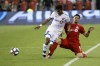 Montreal Impact midfielder Shamit Shome (28) and Toronto FC midfielder Marco Delgado (8) vie for the ball in the second half of the second leg of Canadian Champion soccer action in Toronto, Wednesday, Sept. 25, 2019. Cavalry FC has signed Canadian international midfielder Shome to a multiyear contract. THE CANADIAN PRESS/Cole Burston