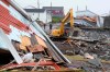 Severe weather caused more than three billion dollars' worth of insured damage in Canada in 2022, from flooding to storms to Hurricane Fiona. A heavy machinery operator continues the cleanup from the post-tropical storm in Port aux Basques, N.L. on Thursday, Sept.29, 2022. THE CANADIAN PRESS/Frank Gunn