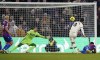Manchester United's Bruno Fernandes, standing right, scores during the Premier League match between Crystal Palace and Manchester United at Selhurst Park in London, Wednesday Jan. 18, 2023. (Adam Davy/PA via AP)