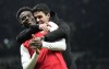 Arsenal's Bukayo Saka and Arsenal's manager Mikel Arteta celebrate their victory at the English Premier League soccer match between Tottenham Hotspur and Arsenal at the Tottenham Hotspur Stadium in London, England, Sunday, Jan. 15, 2023. (AP Photo/Frank Augstein)