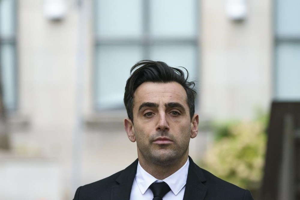 Canadian musician Jacob Hoggard arrives at court for his sentencing hearing in Toronto on Thursday, Oct. 6, 2022. A judicial pre-trial has been scheduled in a northeastern court in the sexual assault case of Canadian musician Jacob Hoggard. The pre-trial, which allows Crown and defence attorneys to seek the judge's input on issues related to the case, is set for Feb. 17 in Haileybury, Ont. THE CANADIAN PRESS/Alex Lupul
